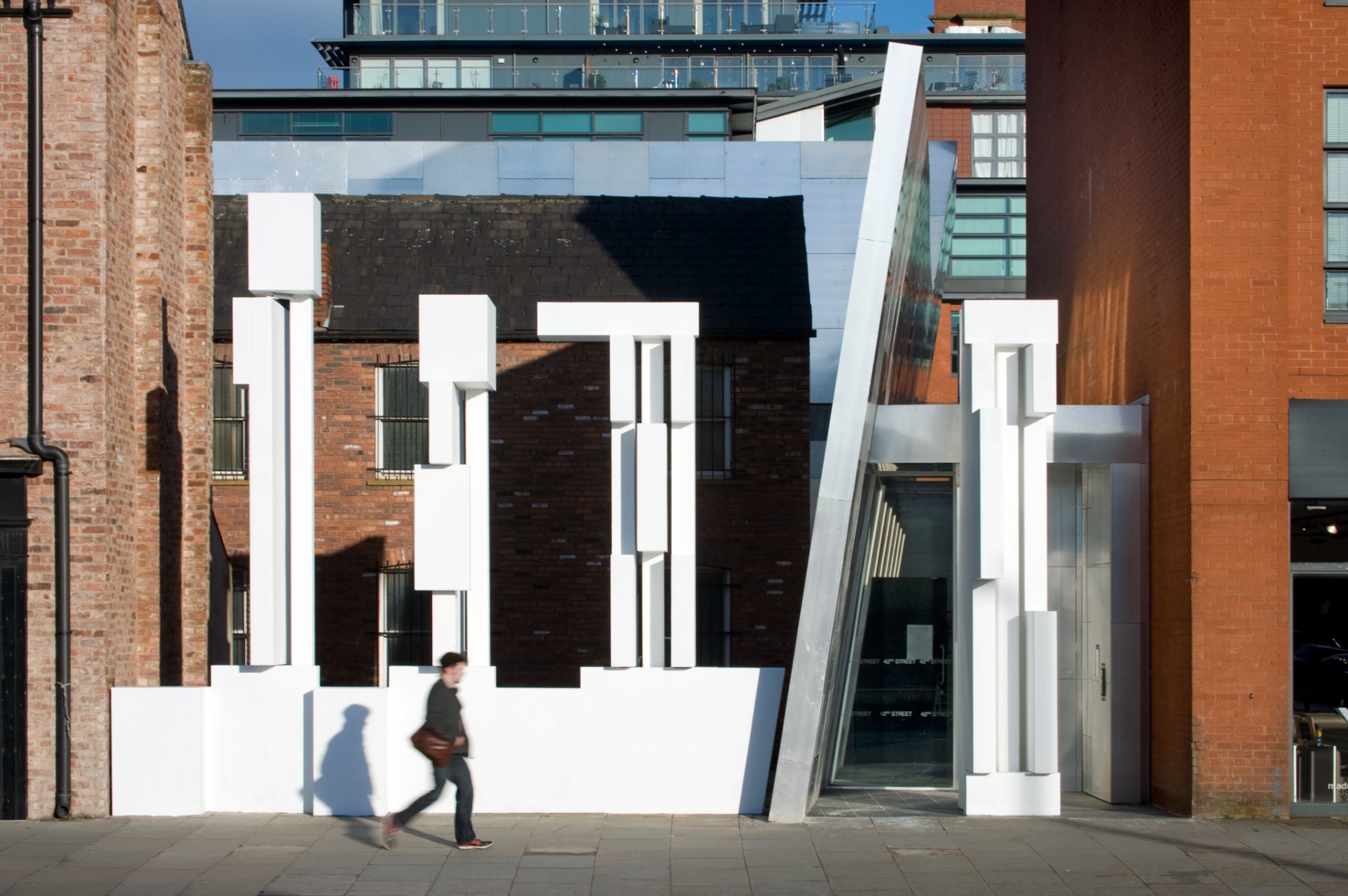 Entrance with leaning wall