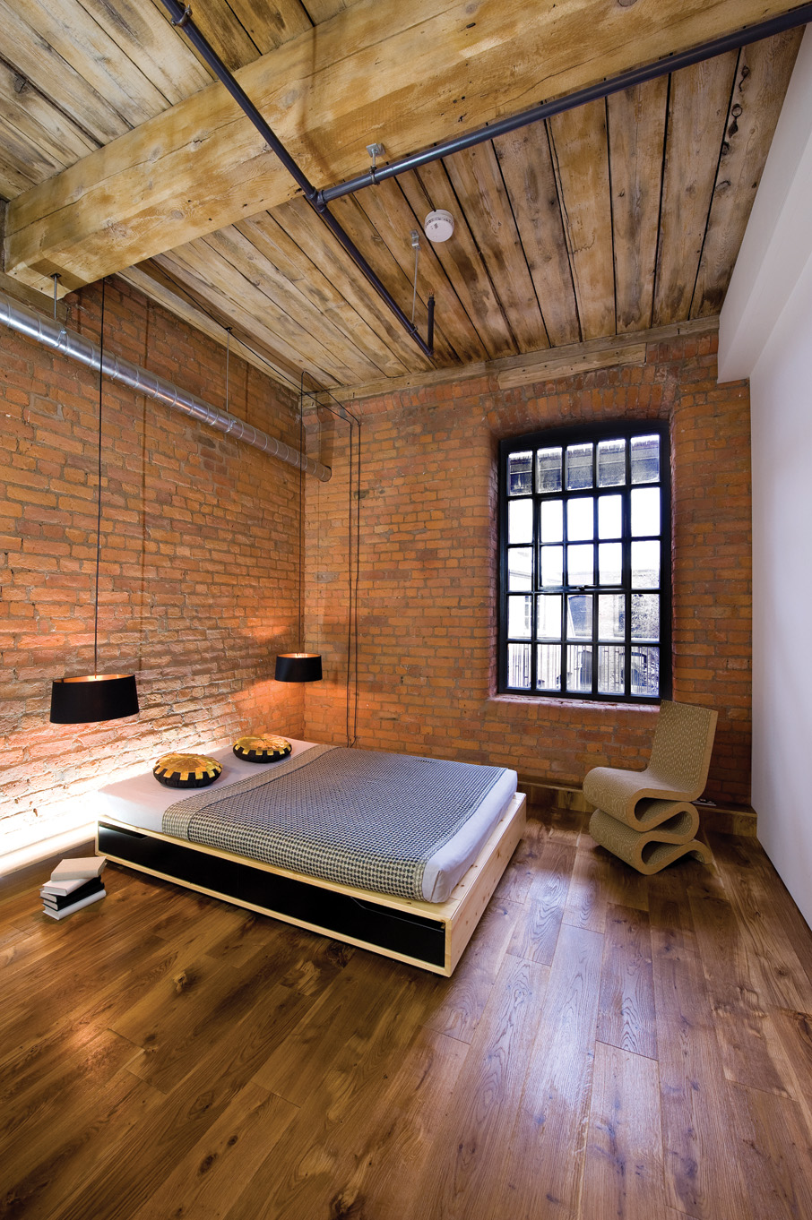 Bedroom — brick walls, pendant lights, timber ceiling