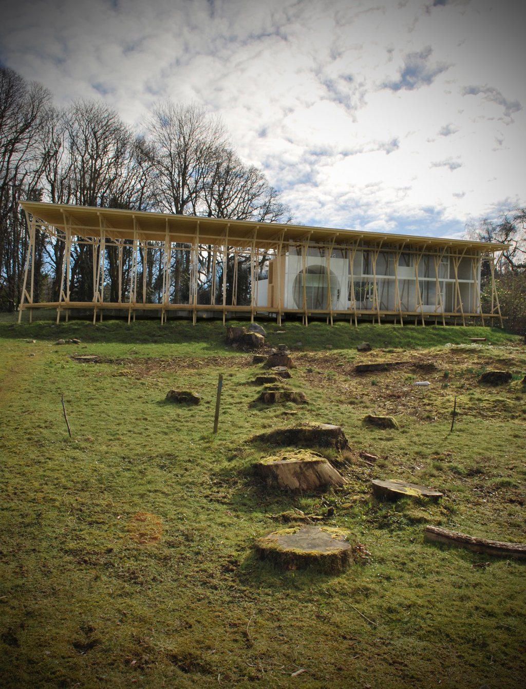 Render — house in landscape with tree stumps