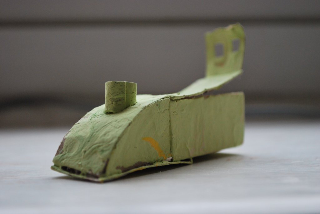 Handmade green train — side view
