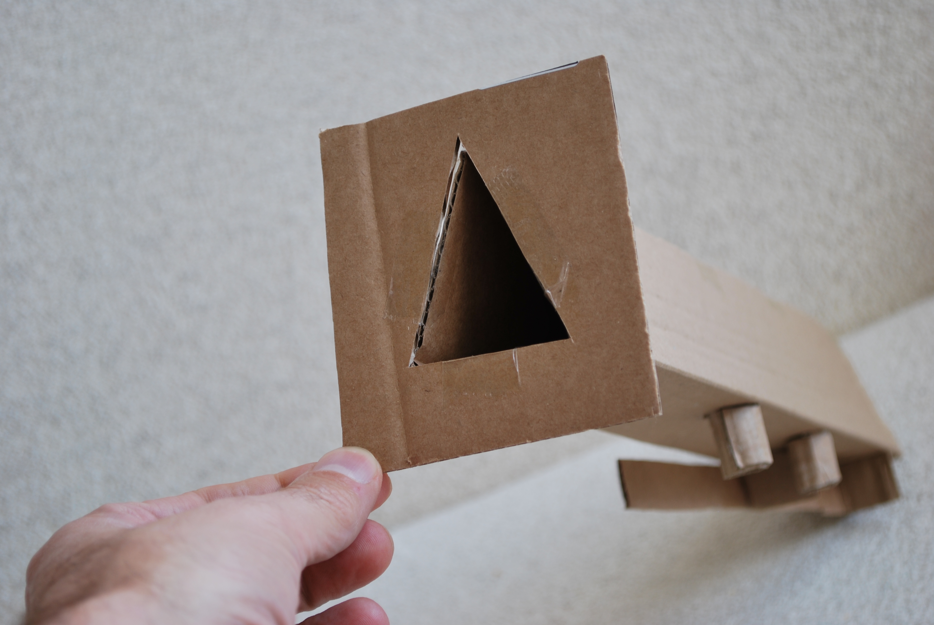 Hand sketch of triangular wellbeing centre and church context