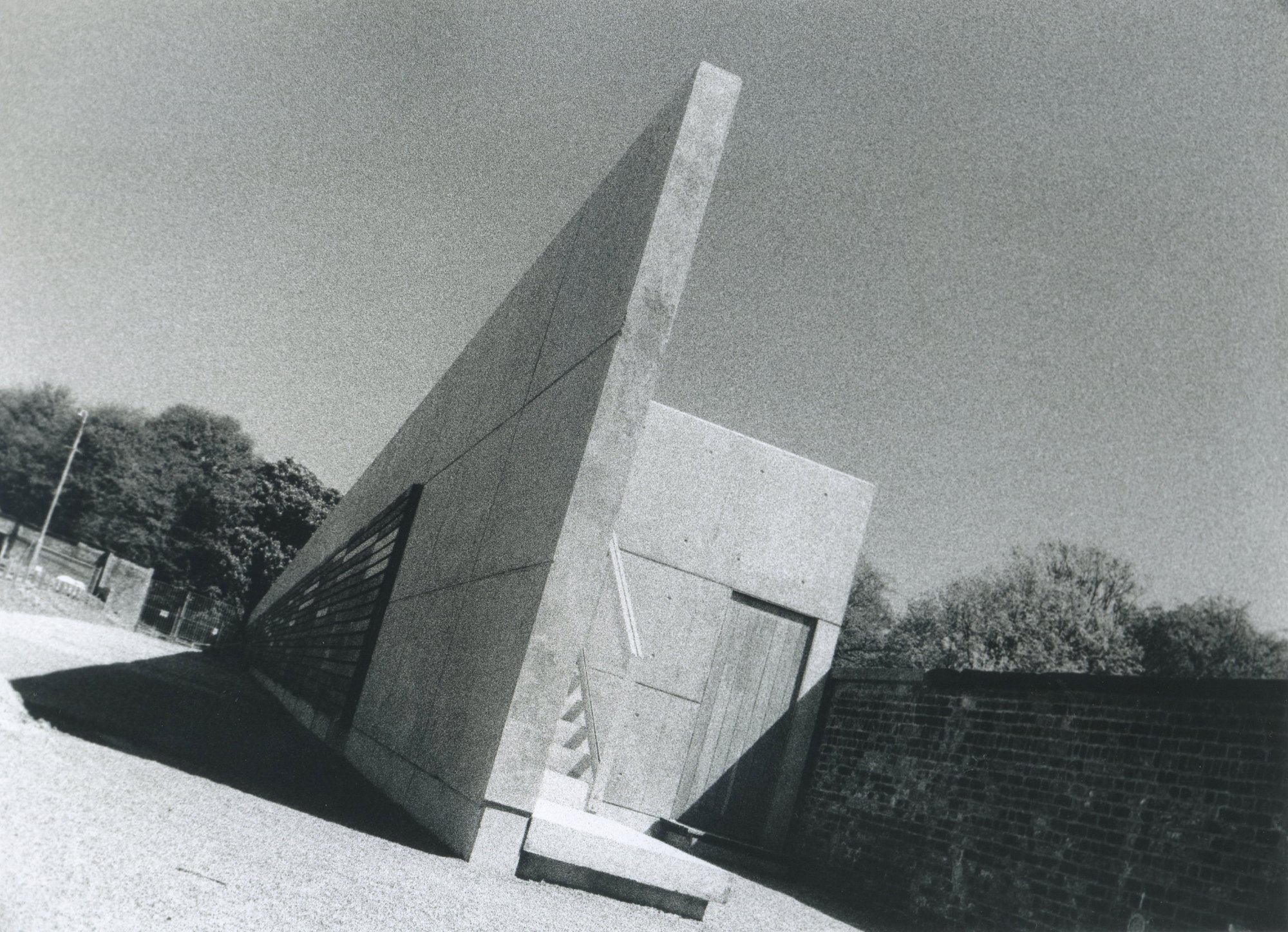 Concrete blade rising from the landscape